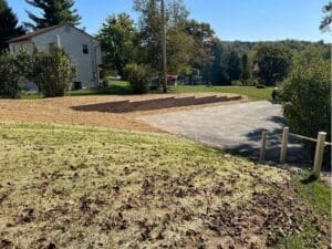 Large residential lawn area prepared for grading and seeding